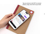 Tapping a phone to the DOT tag on a Campfire notebook cover to connect photos, songs, and locations