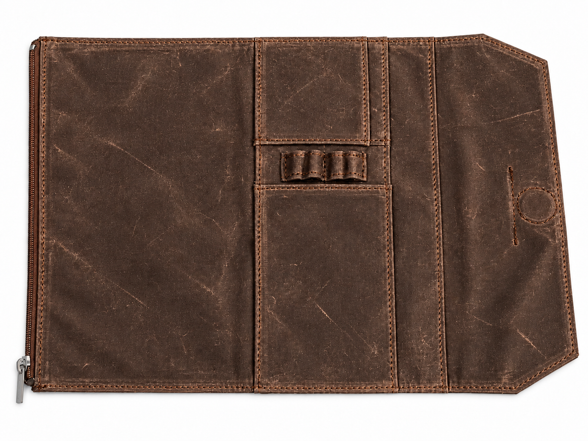 Studio Case waxed canvas pencil case in Timber, open flat showing interior pen loops and card pocket